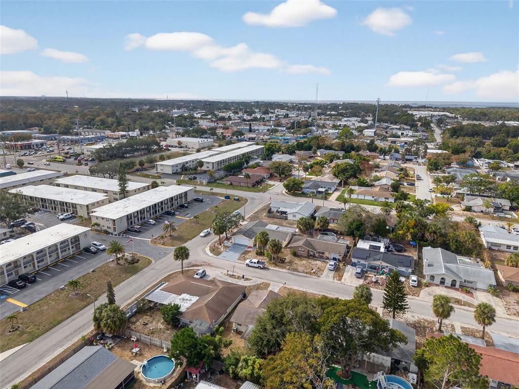 8626 Robilina Road Port Richey, FL 34668 - Photo 59 of 60 an aerial view of a city with lots of residential buildings