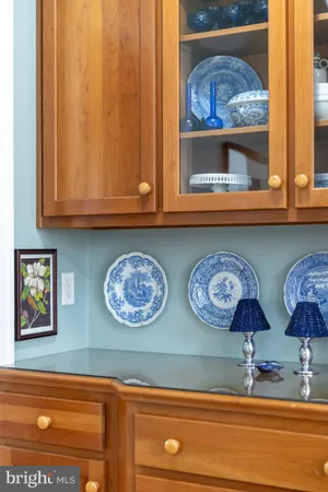 a room with musical instrument pool table and windows
