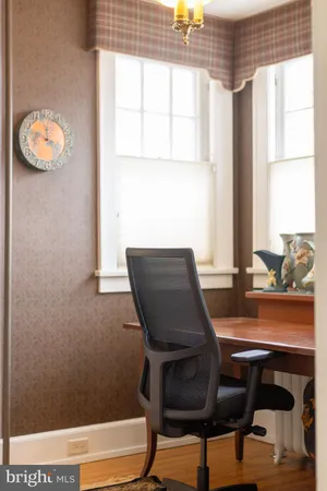 a view of staircase with white walls