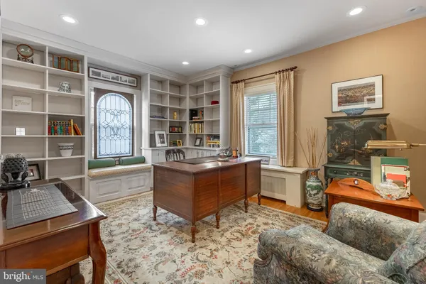 a view of storage and utility room with racks a kitchen