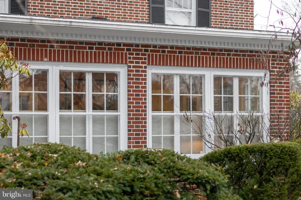 an entryway with a rug