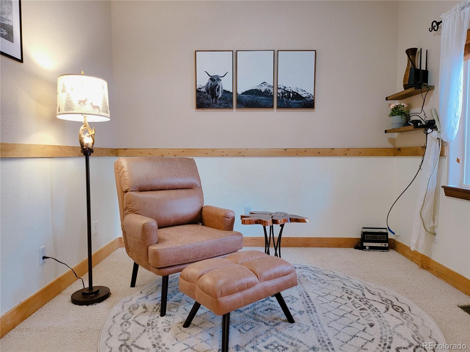 20133 Silver Ranch Road Conifer, CO 80433 - Photo 13 of 40 a view of a livingroom with furniture