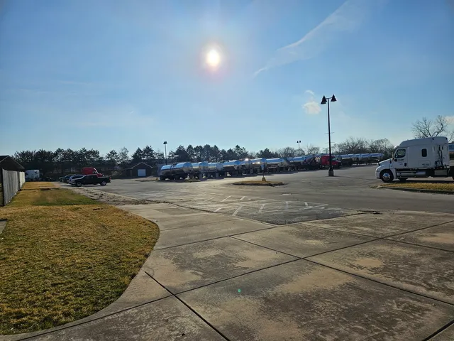 a view of a swimming pool and an outdoor seating