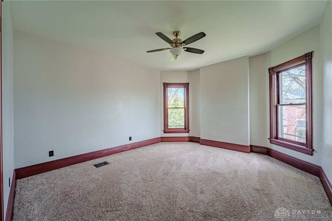 308 Yankee Road Middletown, OH 45044 - Photo 31 of 47 This spacious room features abundant natural light and soft carpeting, creating a comfortable living space.