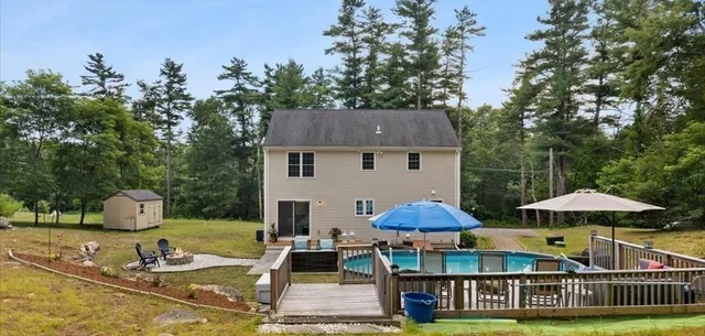 a patio with table and chairs