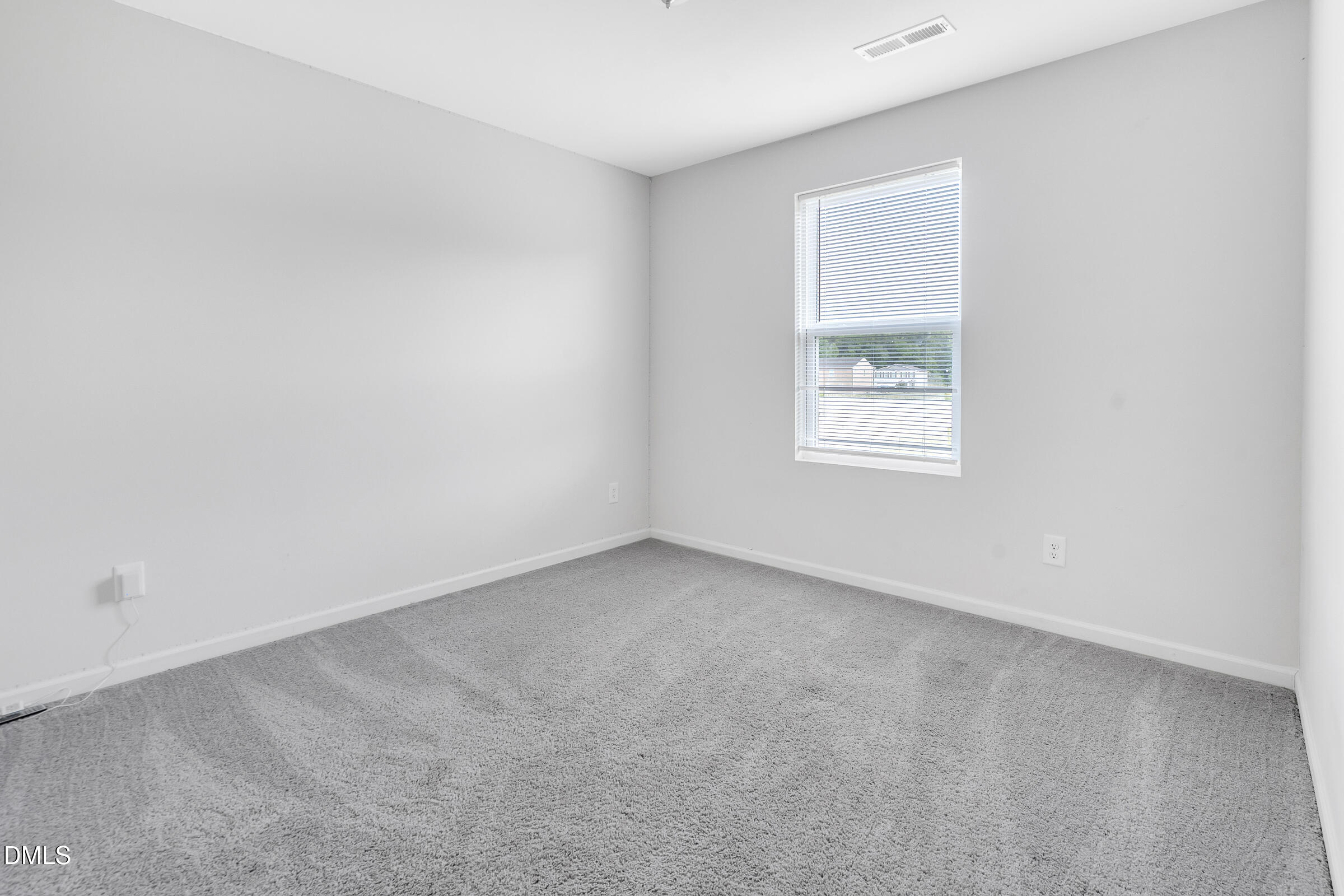 3146 Stoney Hill Church Road Bailey, NC 27807 - Photo 16 of 26 an empty room with a window