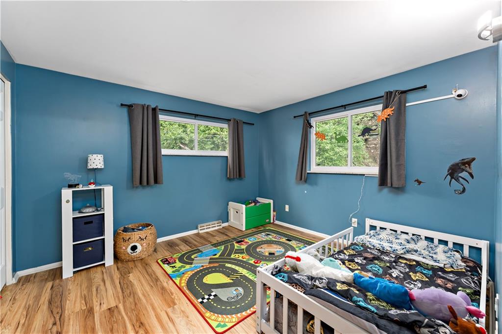 3905 Middleboro Road Pittsburgh, PA 15234 - Photo 17 of 32 a bedroom with bed and a window