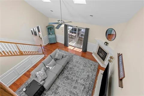 a view of an entryway with wooden floor