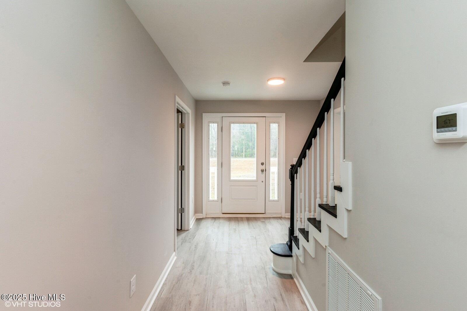 535 Washington Post Road New Bern, NC 28562 - Photo 7 of 20 From rear hallway to front door