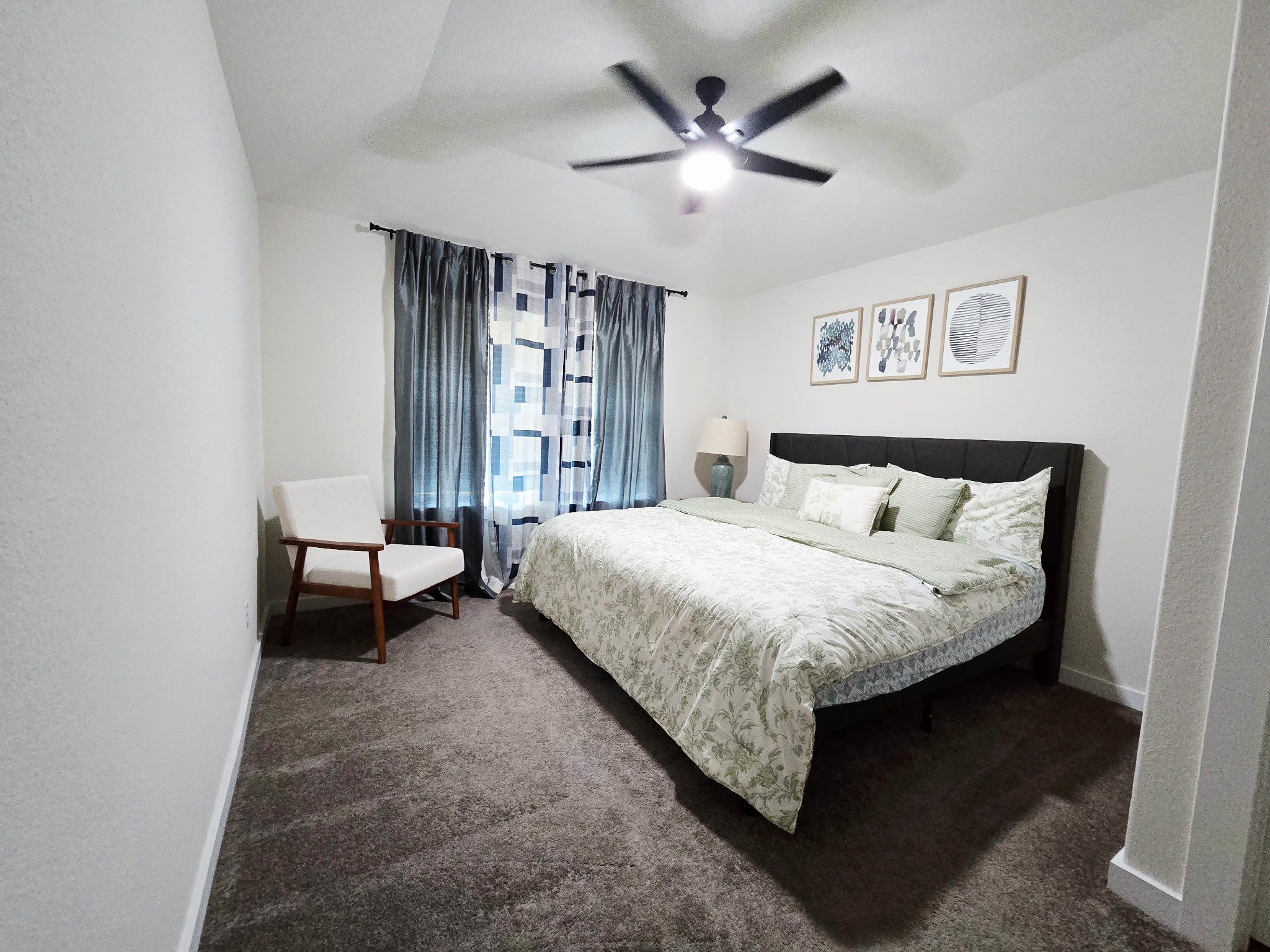 4434 Hannover Way Round Rock, TX 78681 - Photo 14 of 23 Bedroom featuring carpet flooring, a ceiling fan, and a textured wall