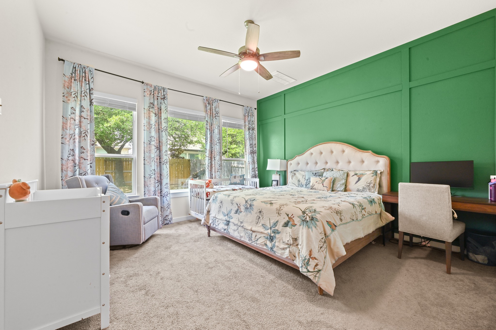4434 Hannover Way Round Rock, TX 78681 - Photo 17 of 40 a spacious bedroom with a bed and a large window