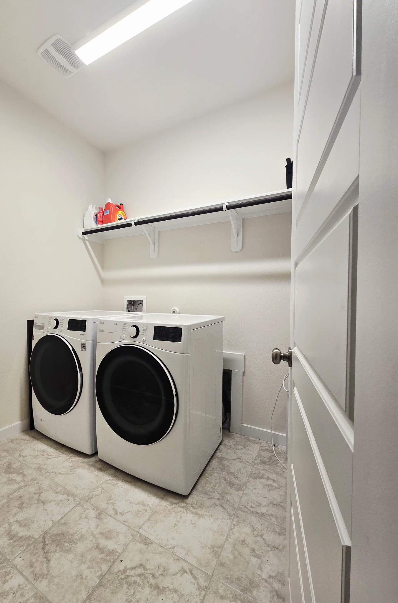 4434 Hannover Way Round Rock, TX 78681 - Photo 18 of 23 Laundry area featuring separate washer and dryer and baseboards