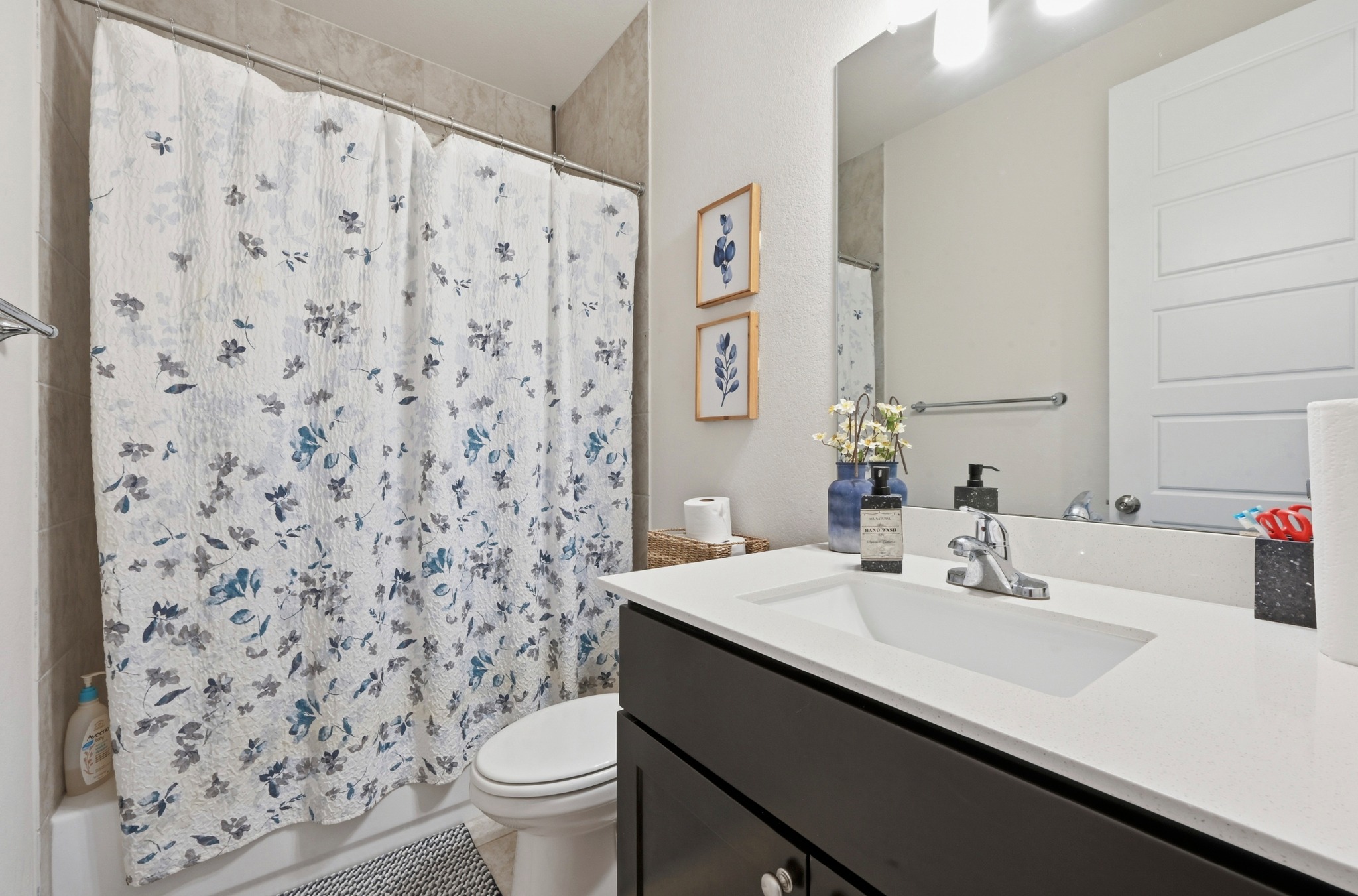 4434 Hannover Way Round Rock, TX 78681 - Photo 21 of 40 a bathroom with a sink toilet and shower