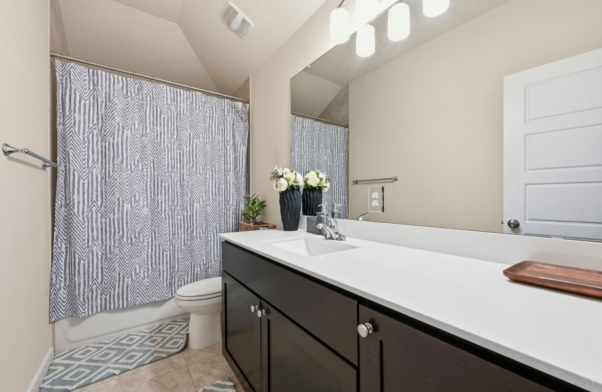 4434 Hannover Way Round Rock, TX 78681 - Photo 29 of 40 a bathroom with a sink and a mirror