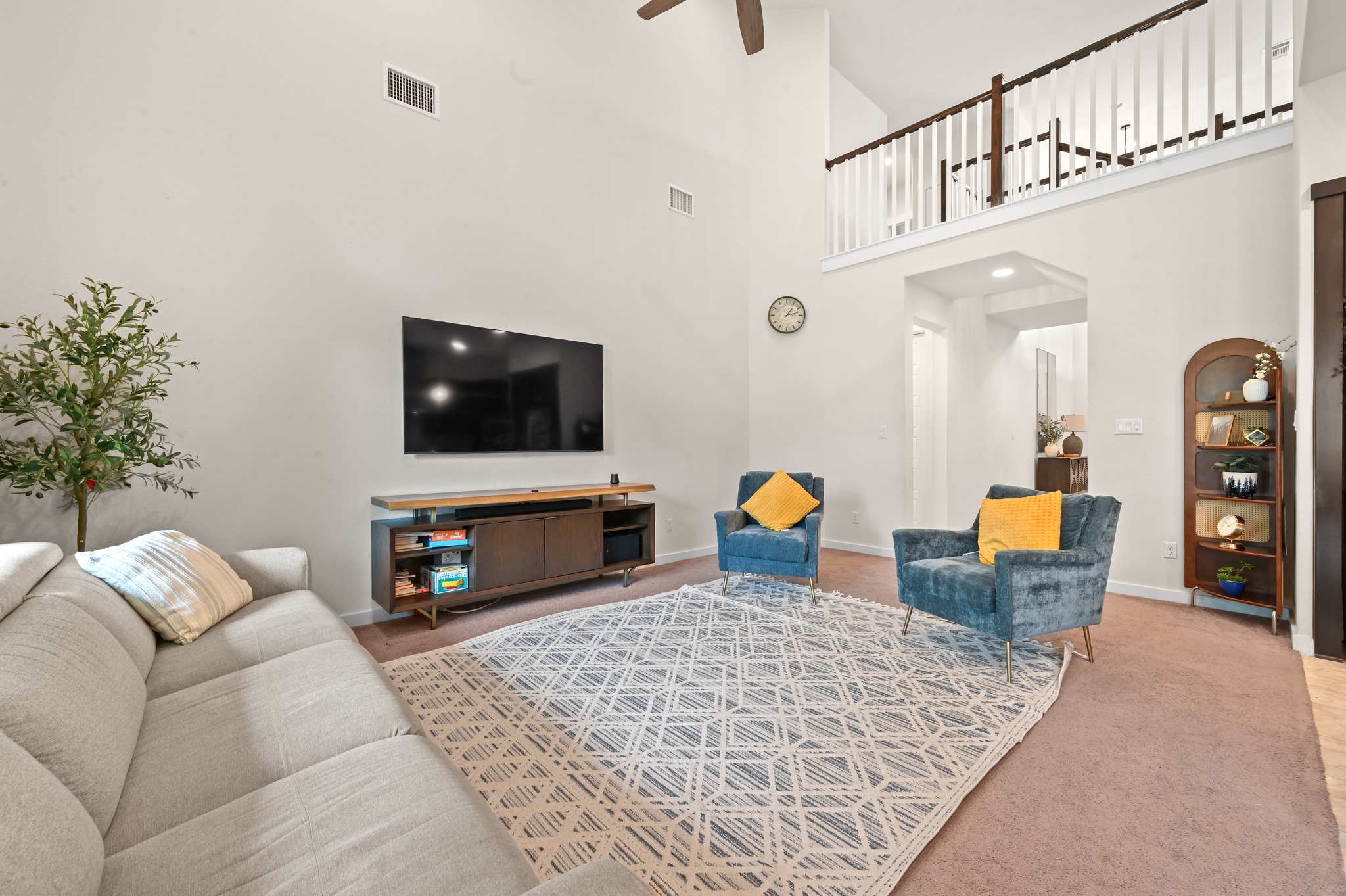 4434 Hannover Way Round Rock, TX 78681 - Photo 9 of 40 a living room with furniture and a flat screen tv