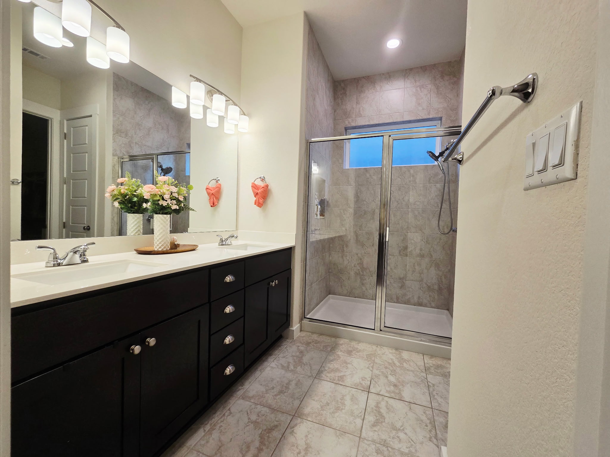 4434 Hannover Way Round Rock, TX 78681 - Photo 10 of 23 Full bathroom featuring double vanity and a stall shower