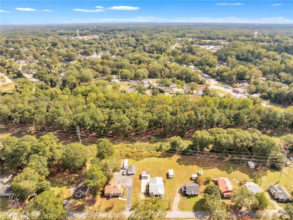 121 Ellison Street Belton, SC 29627 - Photo 27 of 30 This elevated perspective showcases expansive greenery and a charming neighborhood with abundant natural beauty.