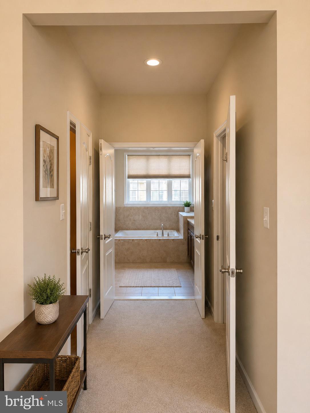 19400 Front Street Leesburg, VA 20176 - Photo 14 of 20 Inviting hallway to serene bath retreat.