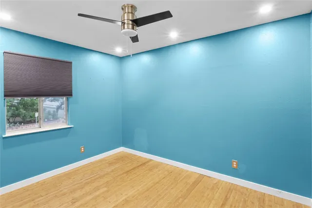 a work room with furniture and book shelf