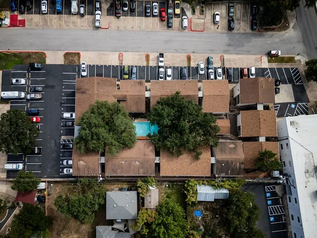 an aerial view of a city with lots of residential buildings