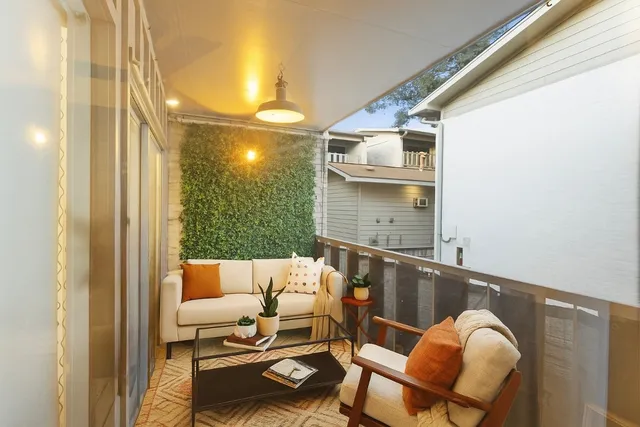 an empty room with a fan