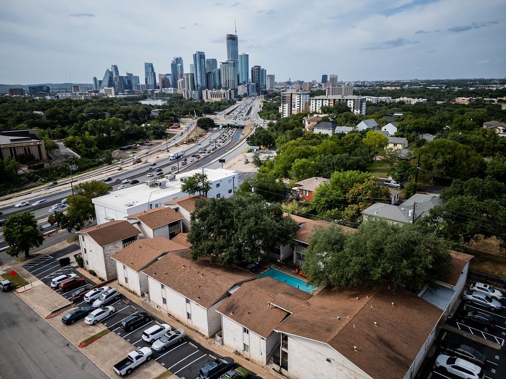 1304 Summit Street, Unit 209 Austin, TX 78741 - Photo 22 of 27 an aerial view of a city with lots of residential buildings
