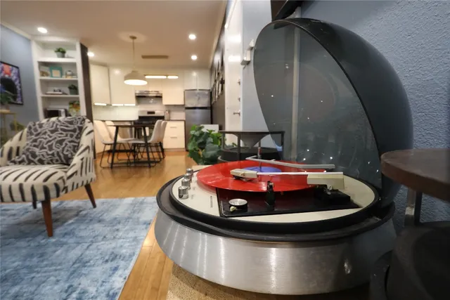 a view of a living room and dining room