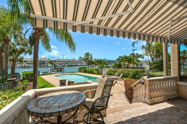 a bathroom with a sink mirror vanity and toilet