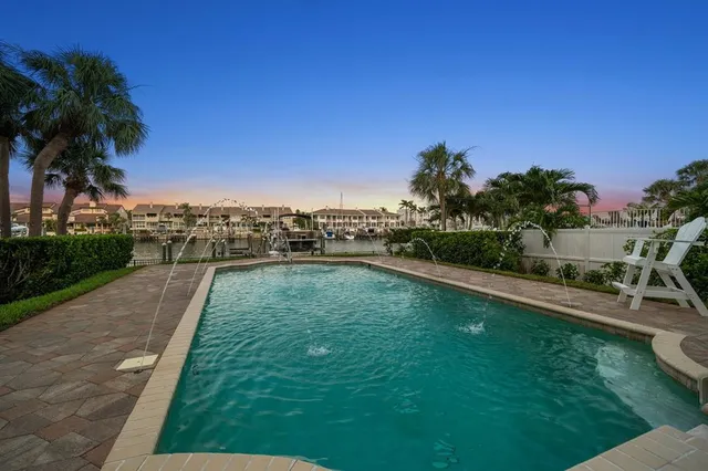 a view of walk in closet and window