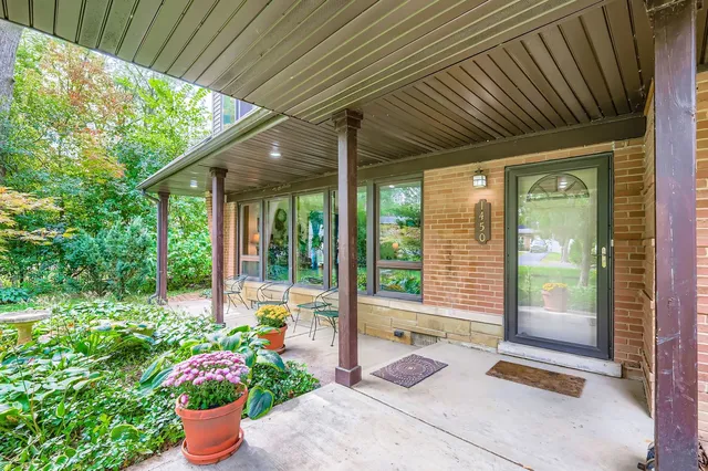 a front view of a house with a porch
