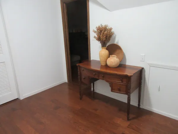 a view of workspace with wooden floor