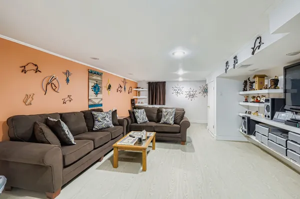 a living room with furniture and a couch