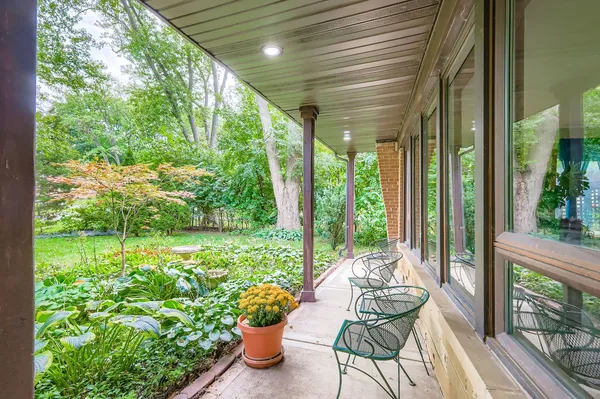 a living room with patio and garden