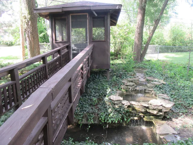 a view of a backyard of the house