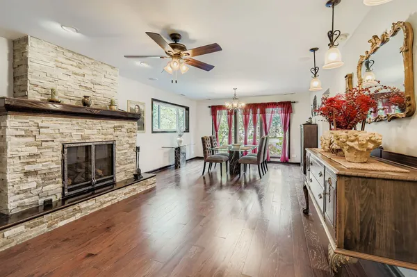 a view of a livingroom with furniture and a fireplace