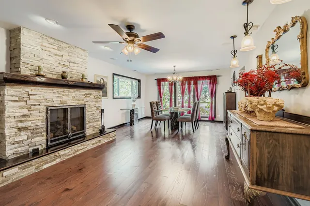 a view of a livingroom with furniture and a fireplace