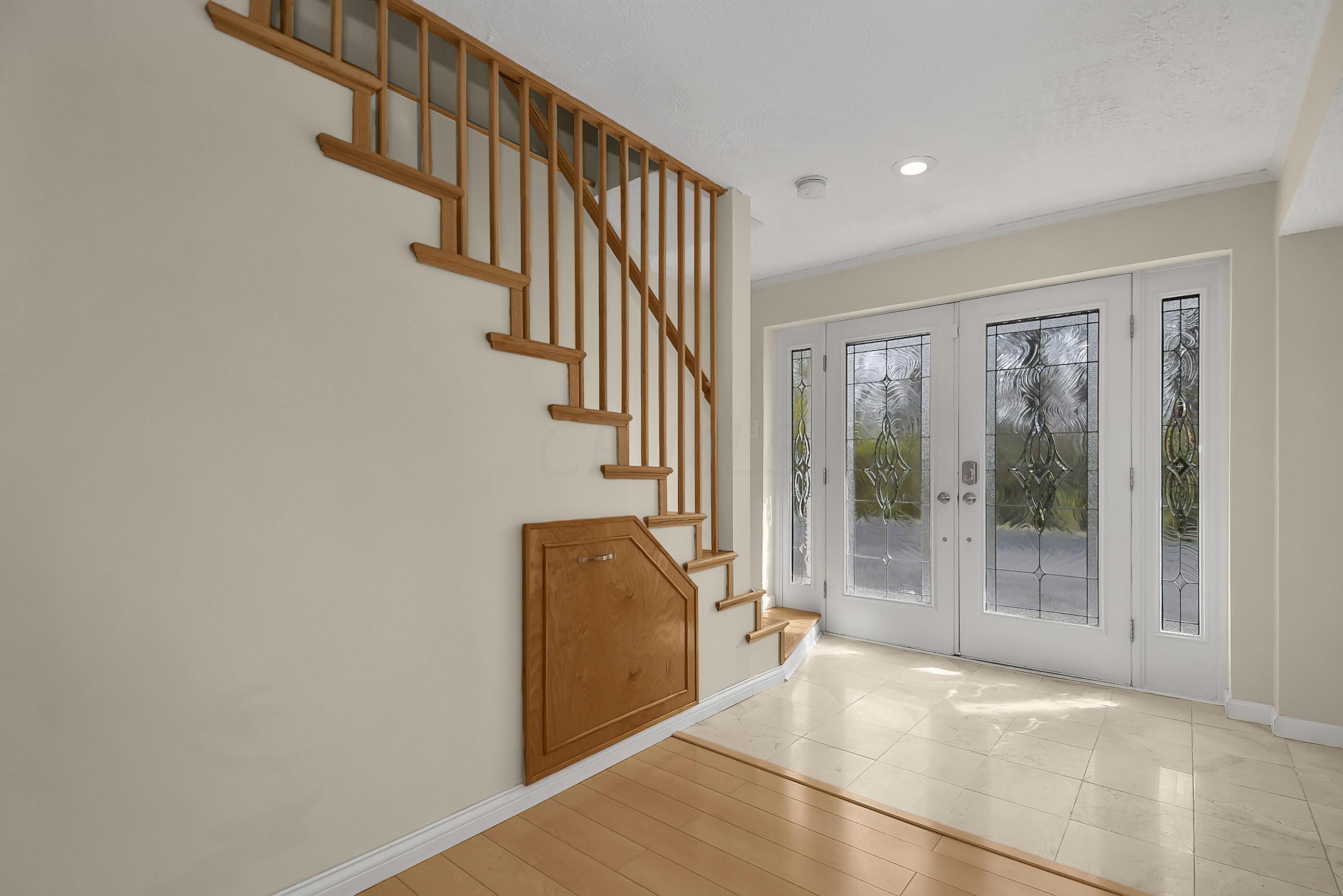 6200 Home Road Delaware, OH 43015 - Photo 24 of 36 Lower Level Entry & Staircase Landing