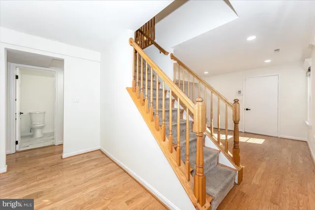 a view of empty room with a fireplace