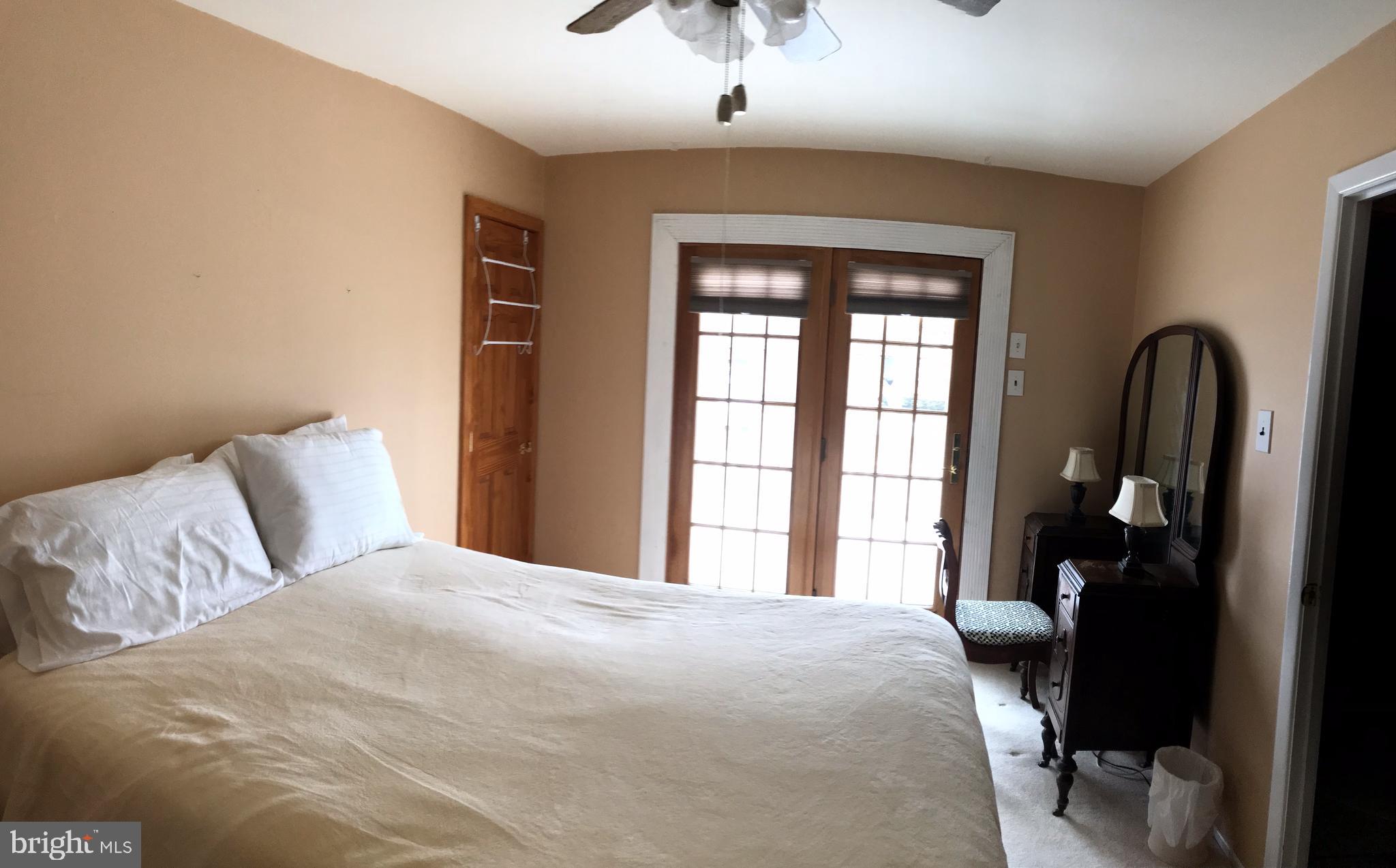 1000 Tomlinson Road Philadelphia, PA 19116 - Photo 16 of 30 1st bedroom with french doors to deck