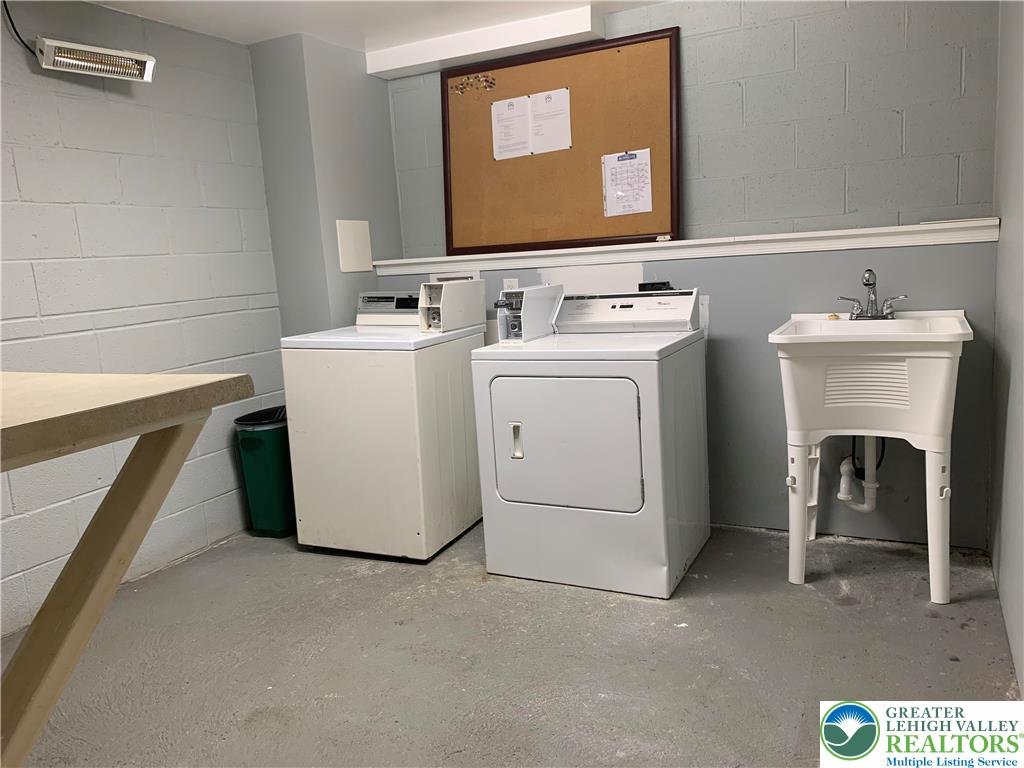 526 Broad Street, Unit 1 Emmaus, PA 18049 - Photo 13 of 15 a utility room with dryer and washer