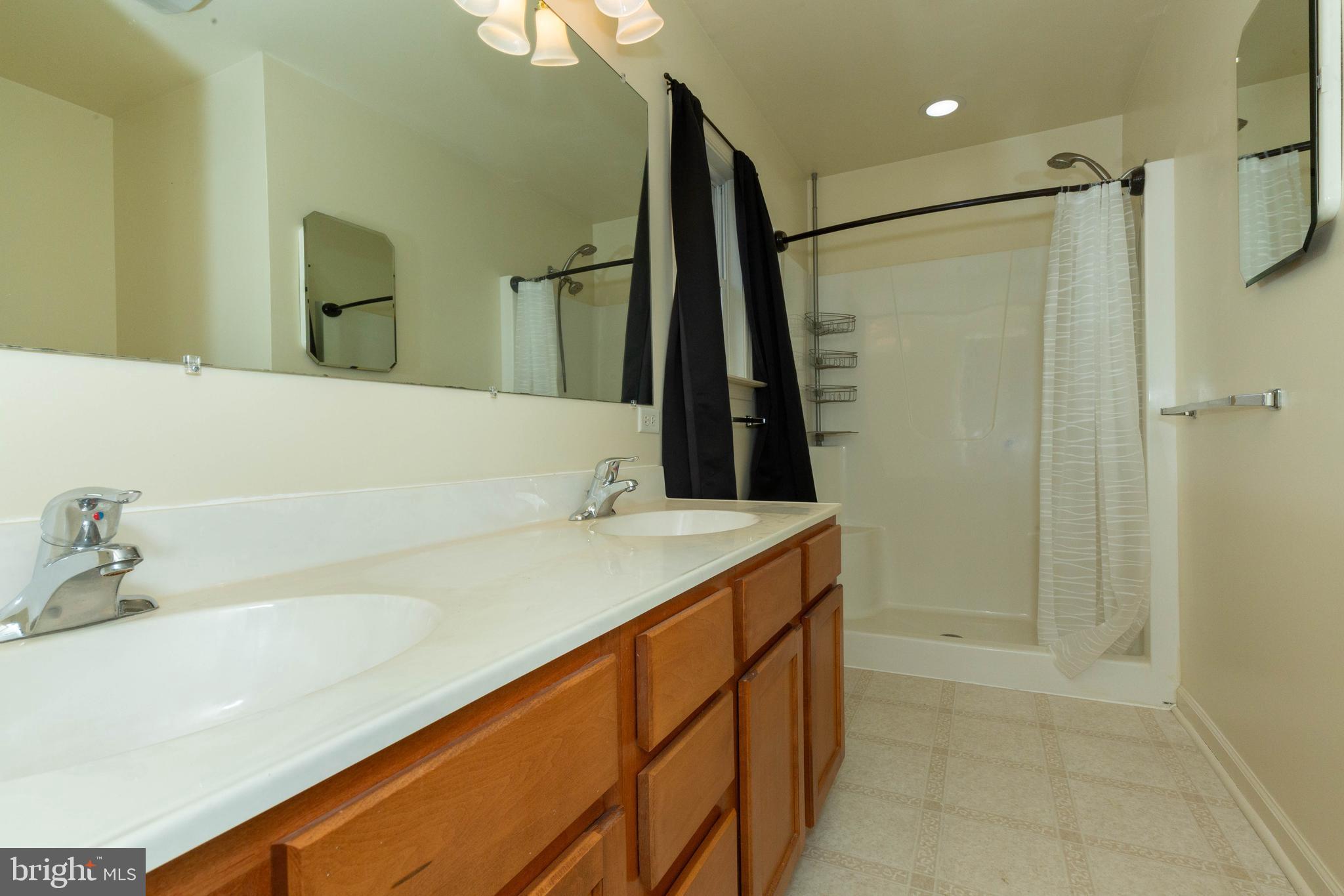 3311 Mission Road Harpers Ferry, WV 25425 - Photo 29 of 37 a bathroom with a sink and a mirror