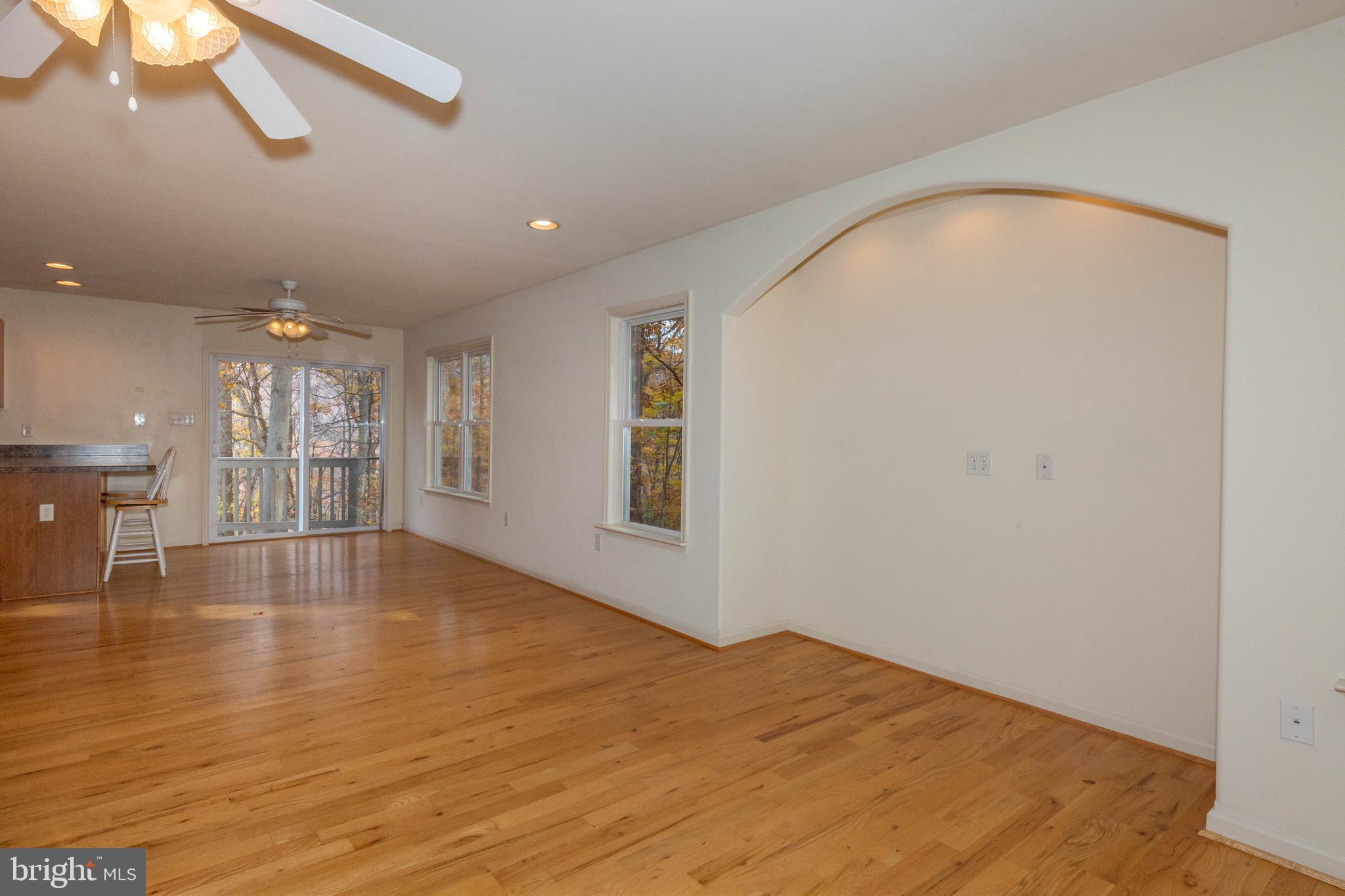 3311 Mission Road Harpers Ferry, WV 25425 - Photo 9 of 37 a view of empty room with wooden floor and fan