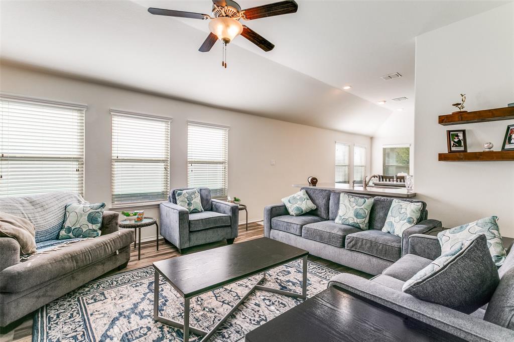14549 Serrano Ridge Road Fort Worth, TX 76052 - Photo 7 of 25 a living room with furniture and a large window