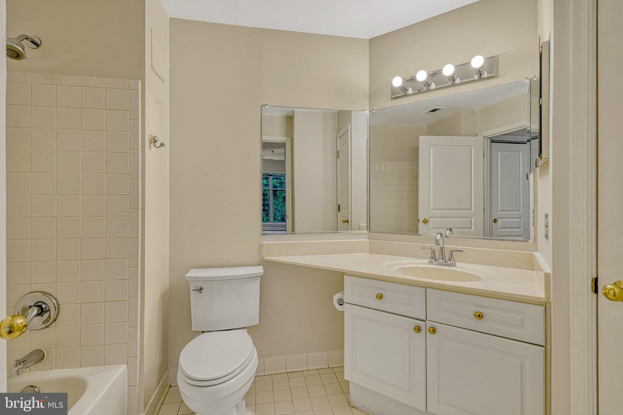 5573 Seminary Road, Unit 104 Falls Church, VA 22041 - Photo 17 of 31 Bedroom 1 ensuite bath with linen closet on right