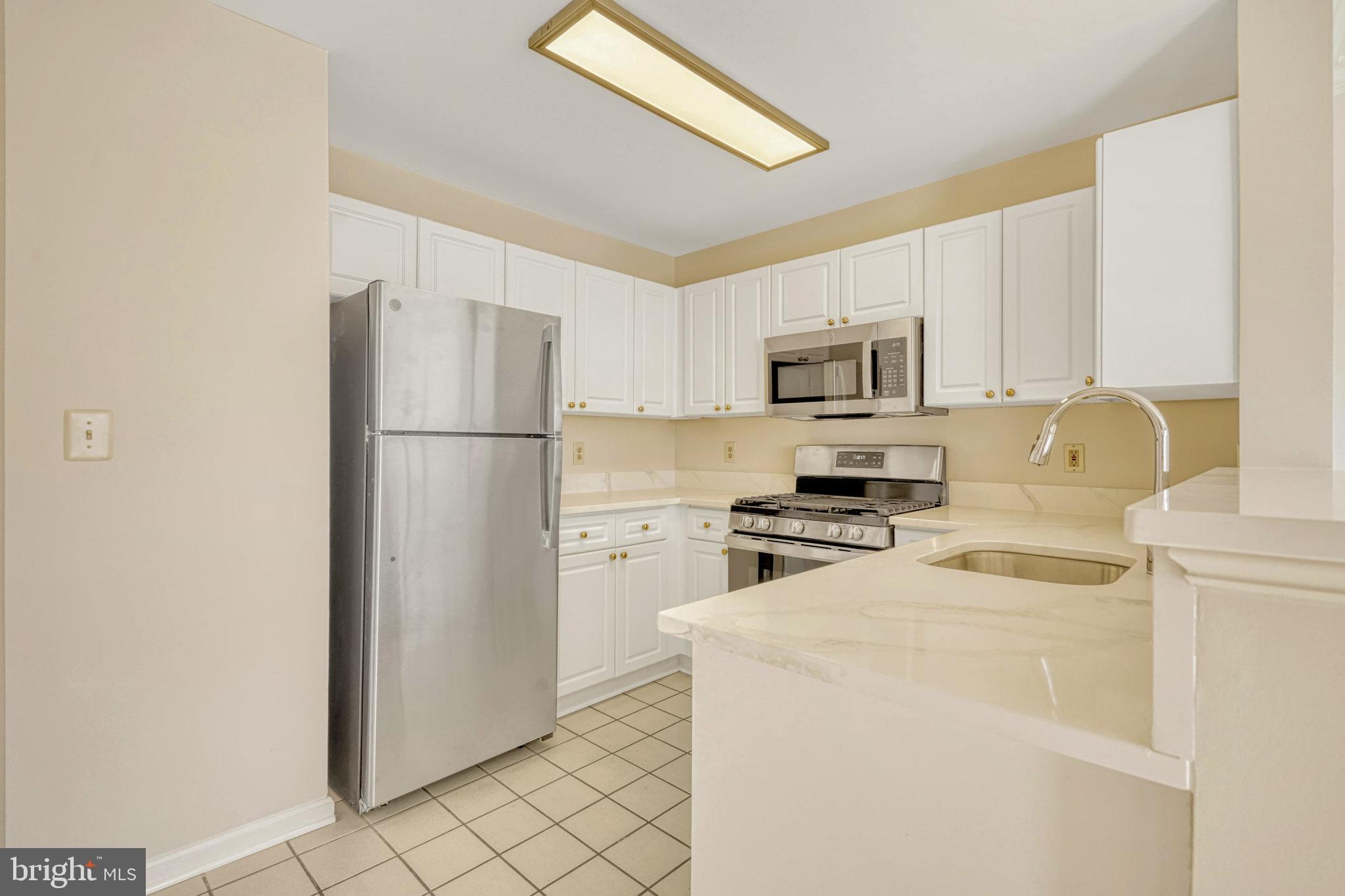 5573 Seminary Road, Unit 104 Falls Church, VA 22041 - Photo 10 of 31 New Quartz Counters & Overhead Light