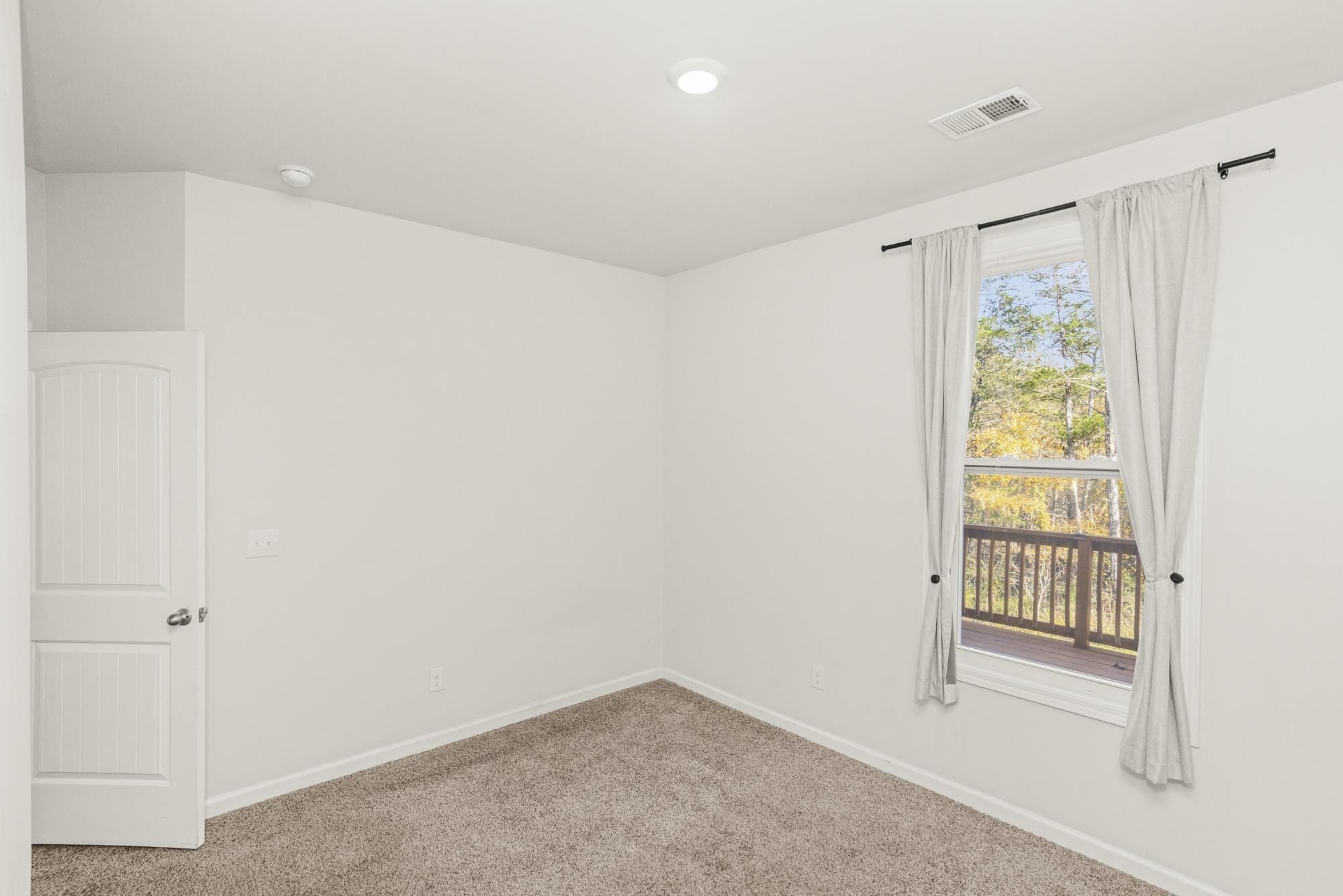 4221 Grapevine Loop Smyrna, TN 37167 - Photo 18 of 27 a view of an empty room with a window