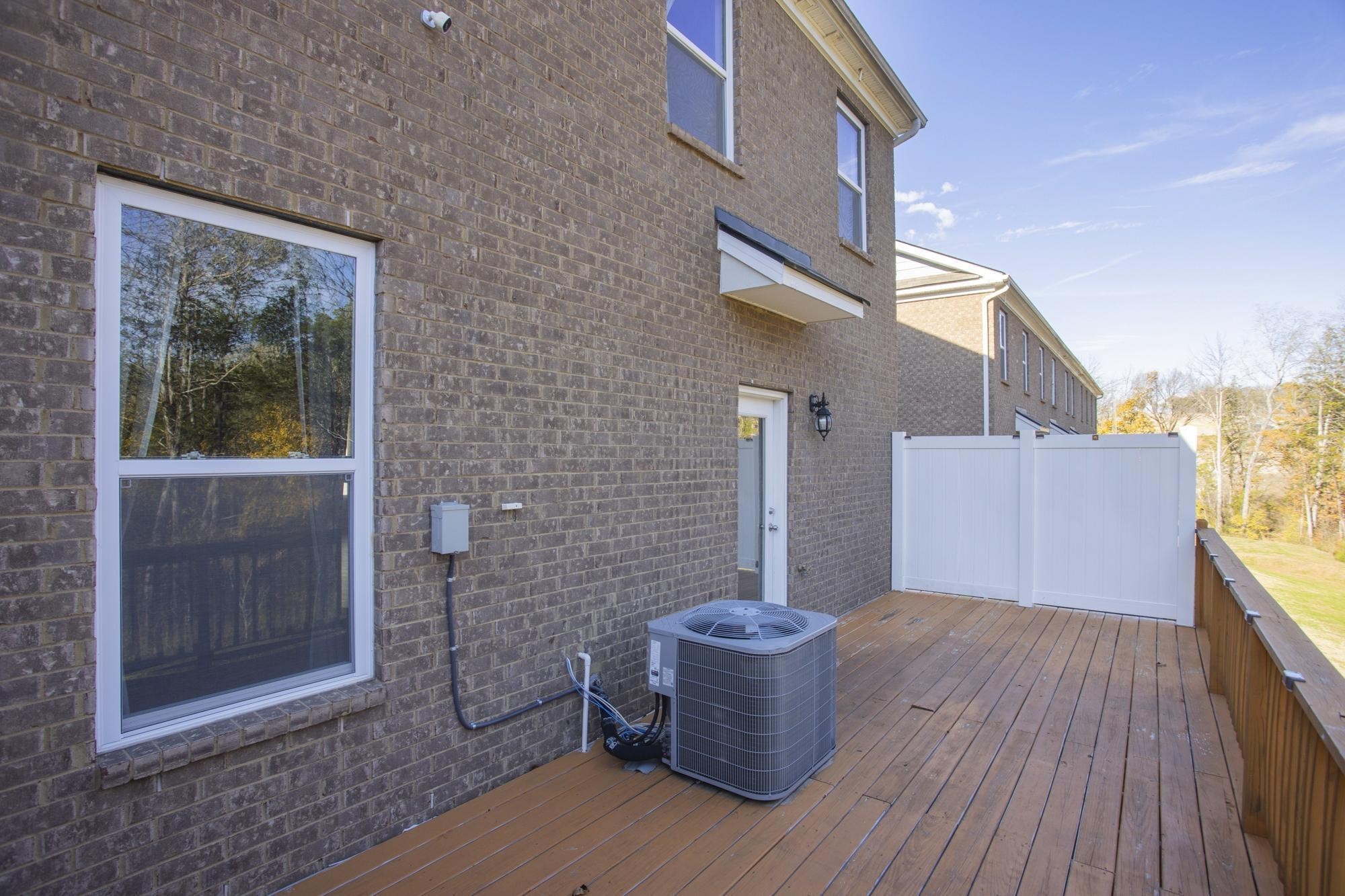 4221 Grapevine Loop Smyrna, TN 37167 - Photo 21 of 27 a view of a house with backyard and glass door