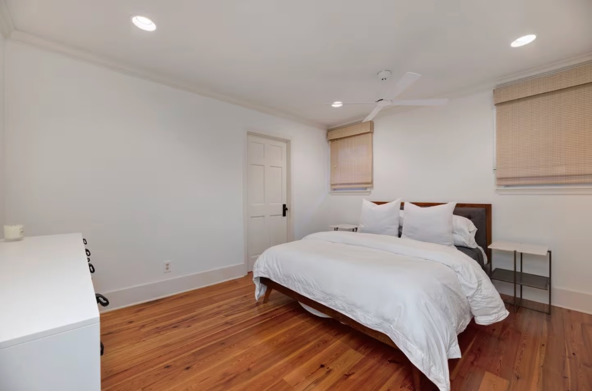 1212 Baylor Street Austin, TX 78703 - Photo 7 of 14 Bedroom with light wood-style flooring and recessed lighting