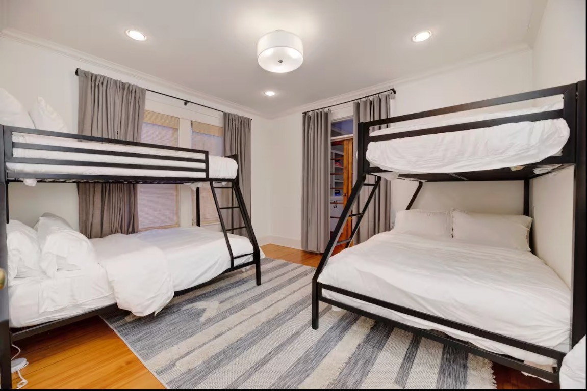 1212 Baylor Street Austin, TX 78703 - Photo 9 of 14 Bedroom featuring light wood finished floors and recessed lighting