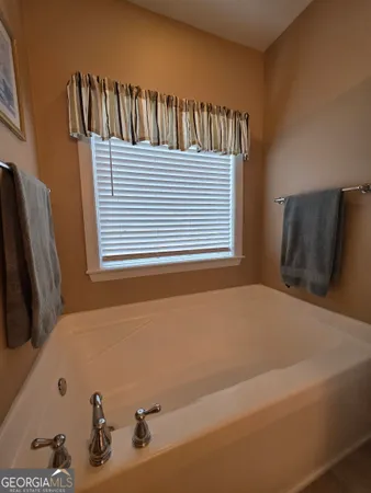 a bathroom with a bathtub